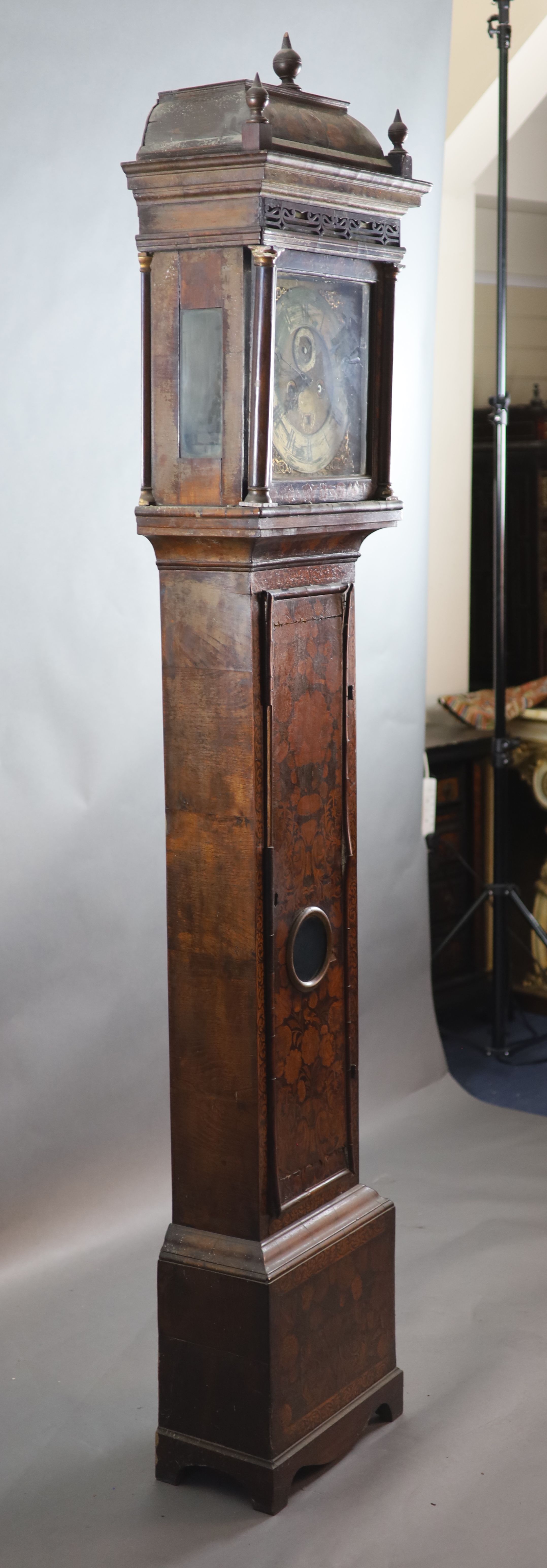 An early 18th century walnut and floral marquetry longcase clock